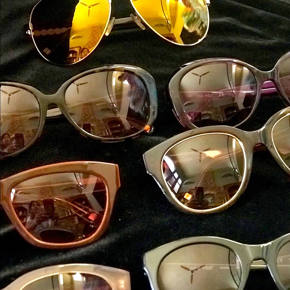 WITH EVERY PURCHASE NINE WEST SUNGLASSES FREE.